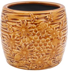 Elevate your décor with this captivating planter - a must-have for any space. Enhance your home with this stylish pot