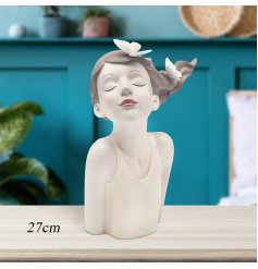 Add enchanting charm to your décor with our elegant fairy head figurine. A chic addition to any space.
