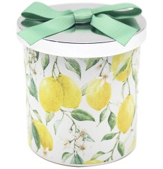 Brighten up your space with this vibrant yellow lemon candle. Perfect for any room in the house!