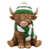 Add some rustic charm to your deco with this lovely little sitting Highland cow.