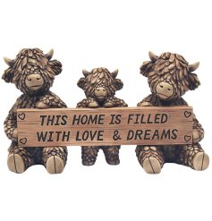Update your living space with this cute family of highland cow ornament.