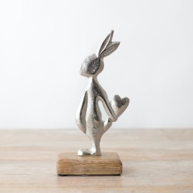 Enhance your decor with a delightful touch of rustic charm from this cute rabbit figurine