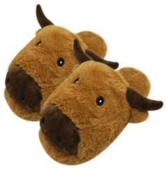 Fluffy cow slippers Designed to keep your feet cosy and warm, they're just the thing to wear on lazy days.