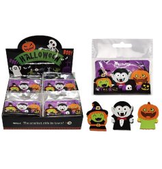 Spooky-themed eraser set with a witch, vampire, and pumpkin design. 
