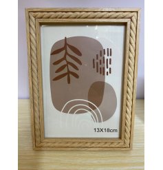 This chic wooden photo frame is great for capturing those special moments.