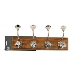 Add some vintage charm to your walls with this set of 4 metal hooks on a chunky wooden base. Perfect for coats, bags, 