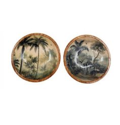 An wooden bowl featuring an enamelled surface with a palm tree  styled pattern. 