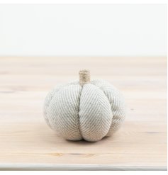 A stylish pumpkin made from a beautiful grey herringbone fabric. Beautifully bound and complete with a jute stalk