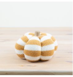 Add a touch of cozy charm to your home with our new 1asst. Fabric Pumpkin Décor 
