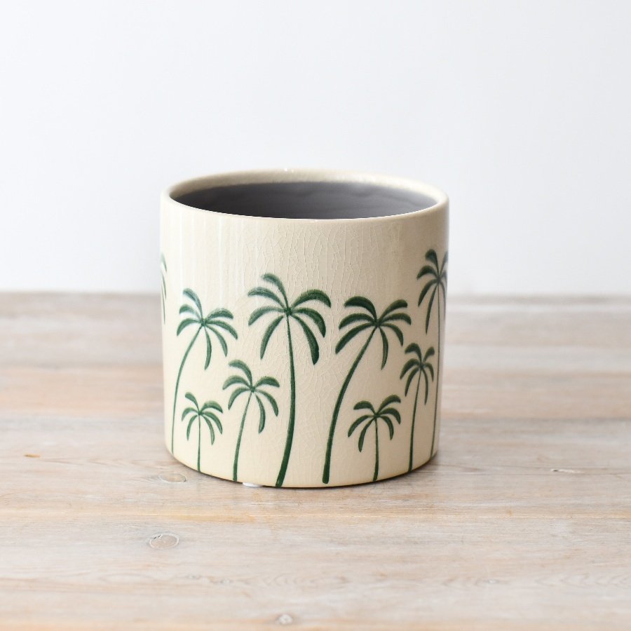  a  indoor chic and durable plant pot with a unique  palm tree pattern