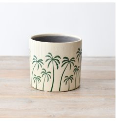 Enhance your space with our stylish and resilient palm tree patterned plant pot that adds charm to any room.