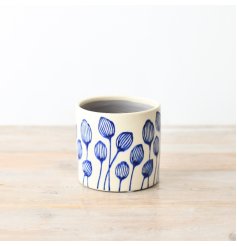 Liven up your home decor with our charming blue leaf plant pot, perfect for displaying your favorite potted plants. 