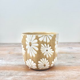 Refresh your plants in a stunning flower planter.