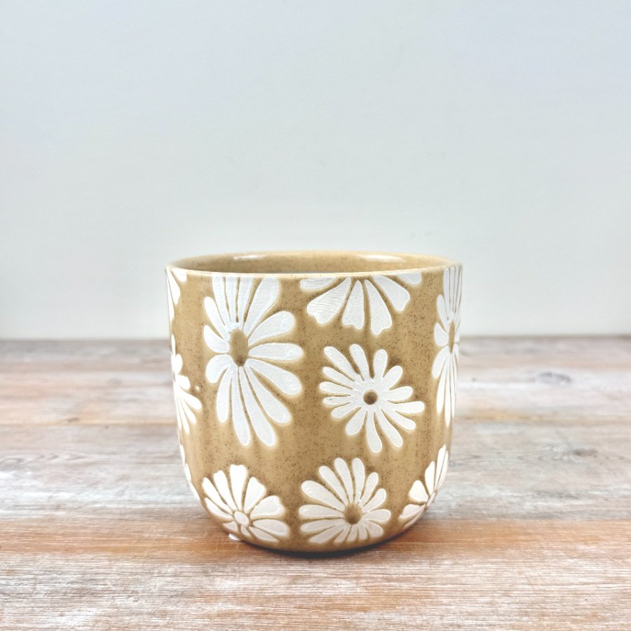 Refresh your plants in a stunning flower planter.