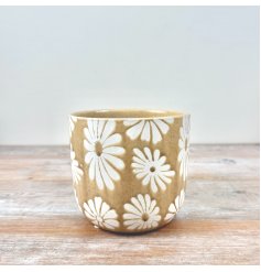 Update your favourite plants in this gorgeous flower design planter 