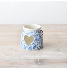 Discover this charming Blue Floral Hare Candle Holder, a beautiful addition to your home decor