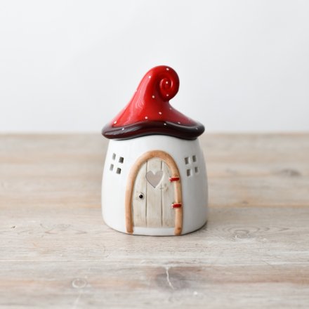 Transform any room into a cozy and tranquil retreat with our Mushroom House Oil Burner 