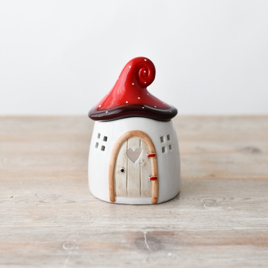 Elevate your space into a calming oasis with our Mushroom House Oil Burner. 