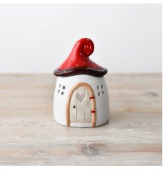 Transform any room into a cozy and tranquil retreat with our Mushroom House Oil Burner 