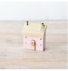Add charm and warmth to your home with our stunning Pink Wooden House Decor! 