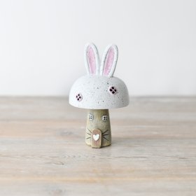 Elevate your decor with our charming Rabbit Roof House Ornament.