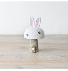 Enhance your decor with our adorable Rabbit Roof House Ornament - a charming addition for any space.