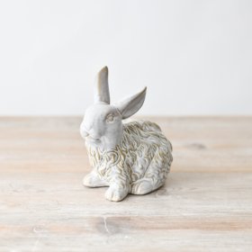 Elevate your home decor with this enchanting rabbit figurine.