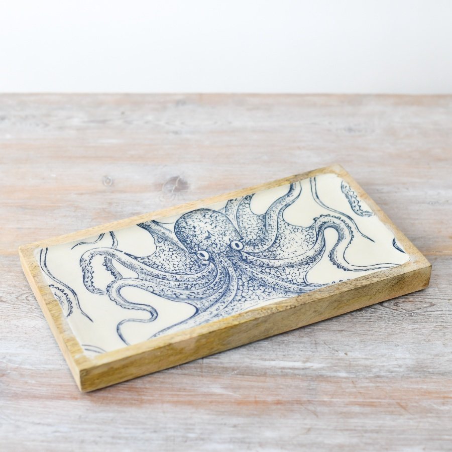 Elevate your interior with this stunning enamel tray, perfect for adding a coastal touch to any room.