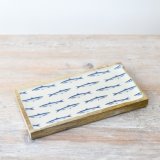 This fish patterned tray made from wood and topped with an enamel glaze is perfect for those beach chalets and humble ab