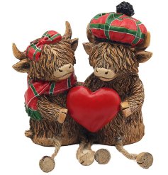 Enhance the home with this charming Highland cow couple ornament, perfect for adding a Scottish touch.