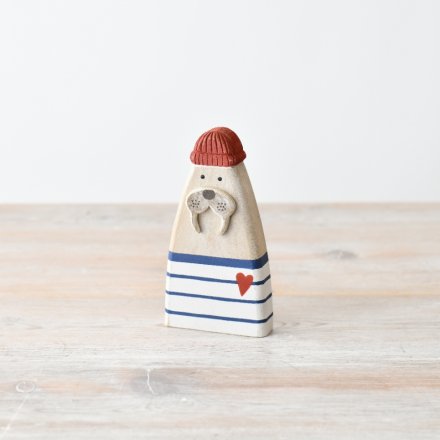 Bring a touch of the ocean into your home with our beautifully crafted wooden Sea Lion figurine. 