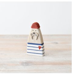 Bring a touch of the ocean into your home with our beautifully crafted wooden Sea Lion figurine. 