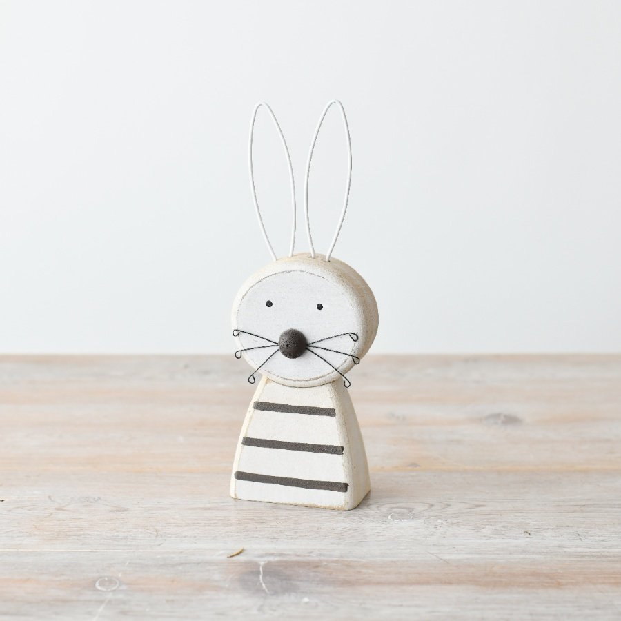 Quaint and cute rabbit figurine adds charm to any decor.