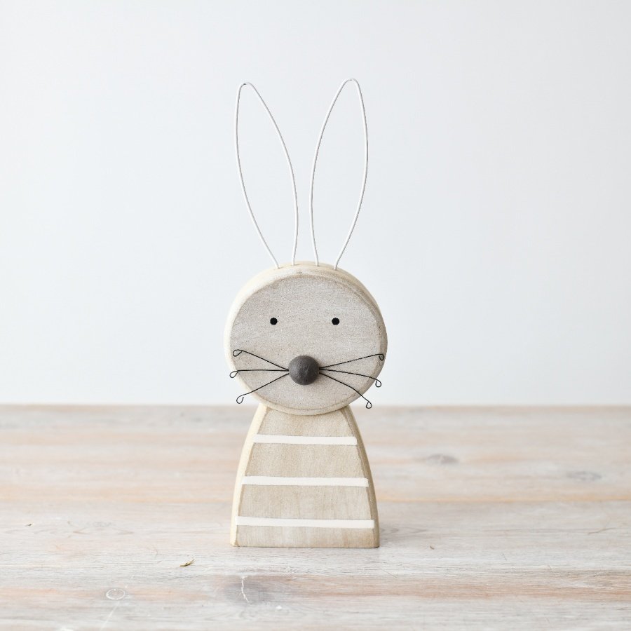 Add a touch of Easter charm to your home decor with this charming rabbit decoration piece.