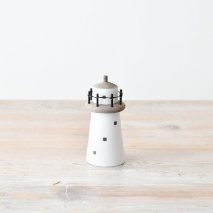 Add a coast charm top your deco with this cute light house deco