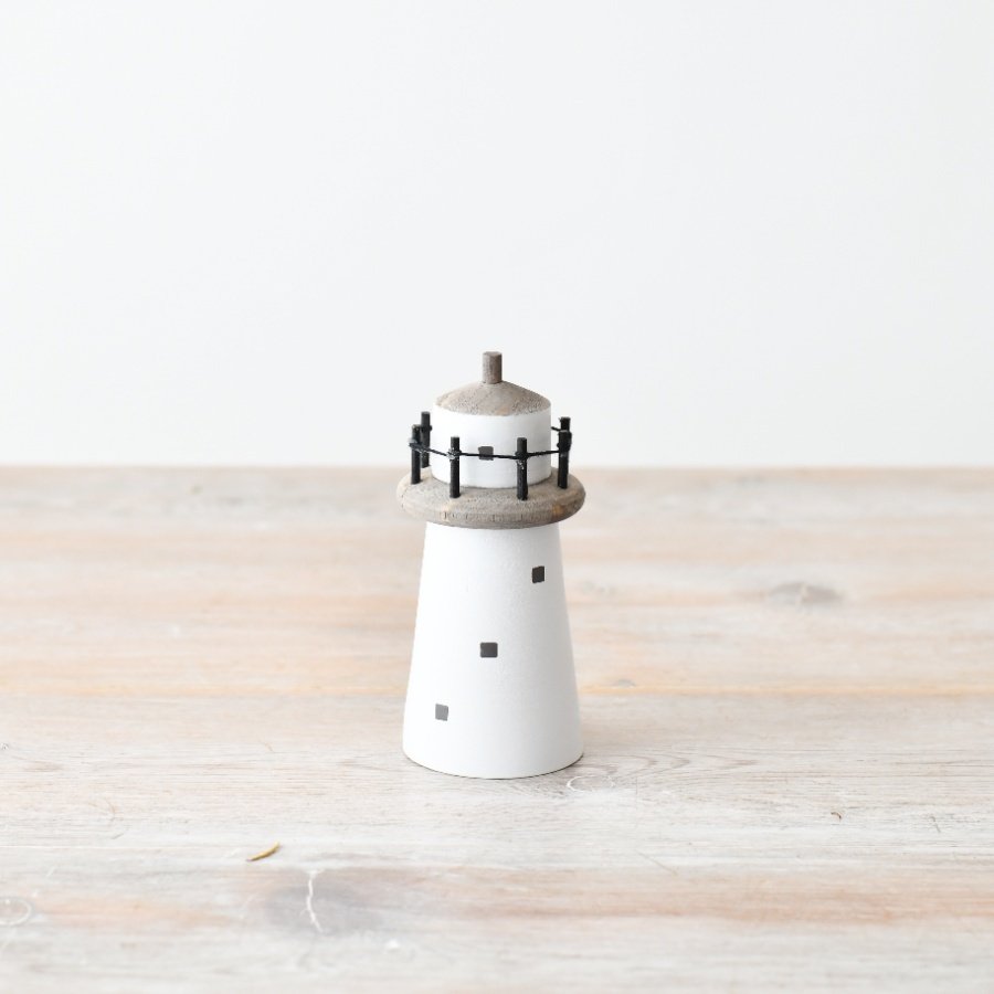 Revamp your decor with charm: this cute light house statue makes the perfect addition to your coastal-inspired home.