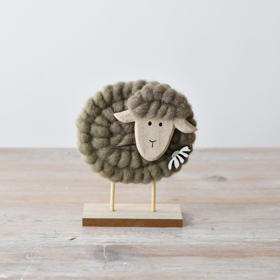 Add a touch of country charm with this fluffy, wooly sheep decor