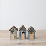 Add a touch of seaside charm to your home with our LED speckled blue beach house ornament! 