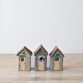 Illuminate your home with coastal charm! Our LED blue beach house ornament 