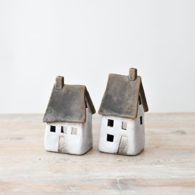 Unique speckled white house decoration with a charming and adorable appearance. Perfect for adding a touch of cuteness