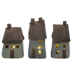 Add a touch of elegance and warmth to any room with our stunning LED speckled blue house. 