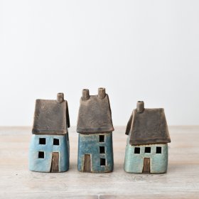 Illuminate your space with our beautiful LED blue house - a perfect blend of warmth and sophistication. 