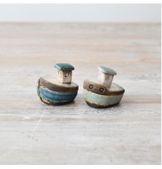 Set sail with our Speckled Blue Ceramic Boat - a must-have for home decorators