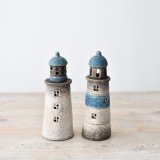 Add a warm and inviting glow to your home with this light up light houses 