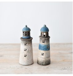 Illuminate your home with cozy charm using our light-up light houses.