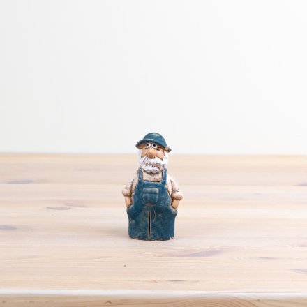 Add a charming touch of countryside to your décor with our "Farmer Speckled Blue" figurine 