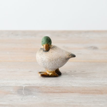 Adorable speckled duck figurine adds charm to any home. Perfect for bird lovers. 