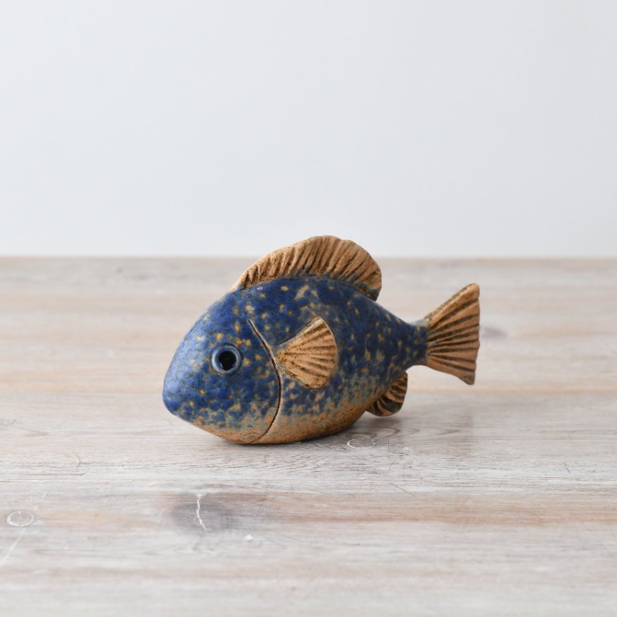 Bring marine charm to your space with our speckled fish decor - perfect for adding a touch of the sea to your home.