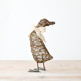 Add a touch of whimsy to your home decor with this charming Duck crafted from a delightful blend of rattan and metal.
