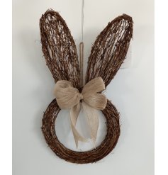 Add a touch of nature and whimsy to your home with our charming Rattan Rabbit Hanging, crafted from rattan